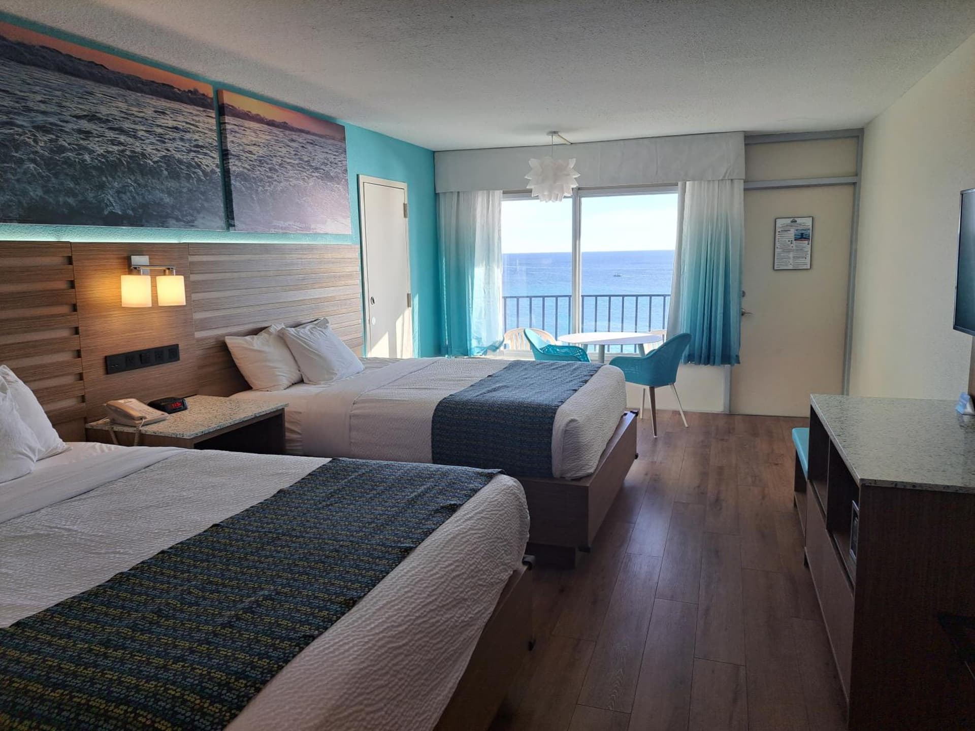 Queen Room with Two Queen Beds and Beach View - Non-Smoking at Days Inn by Wyndham Panama City Beach Beachfront Resort in Panama City Beach, FL