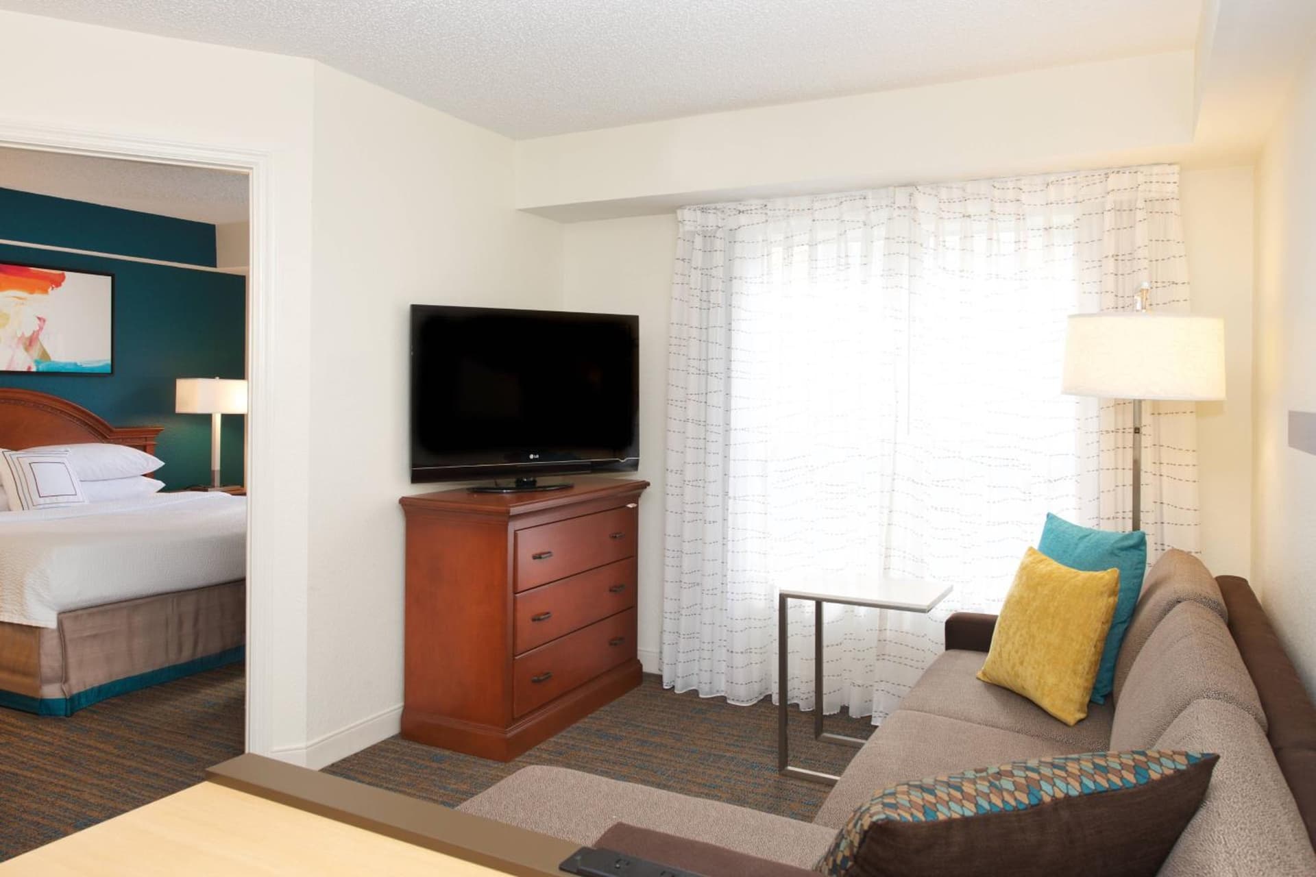 One-Bedroom King Suite with Sofa Bed and Adapted Tub - Mobility Accessible at Residence Inn Orlando Lake Buena Vista in Orlando, FL