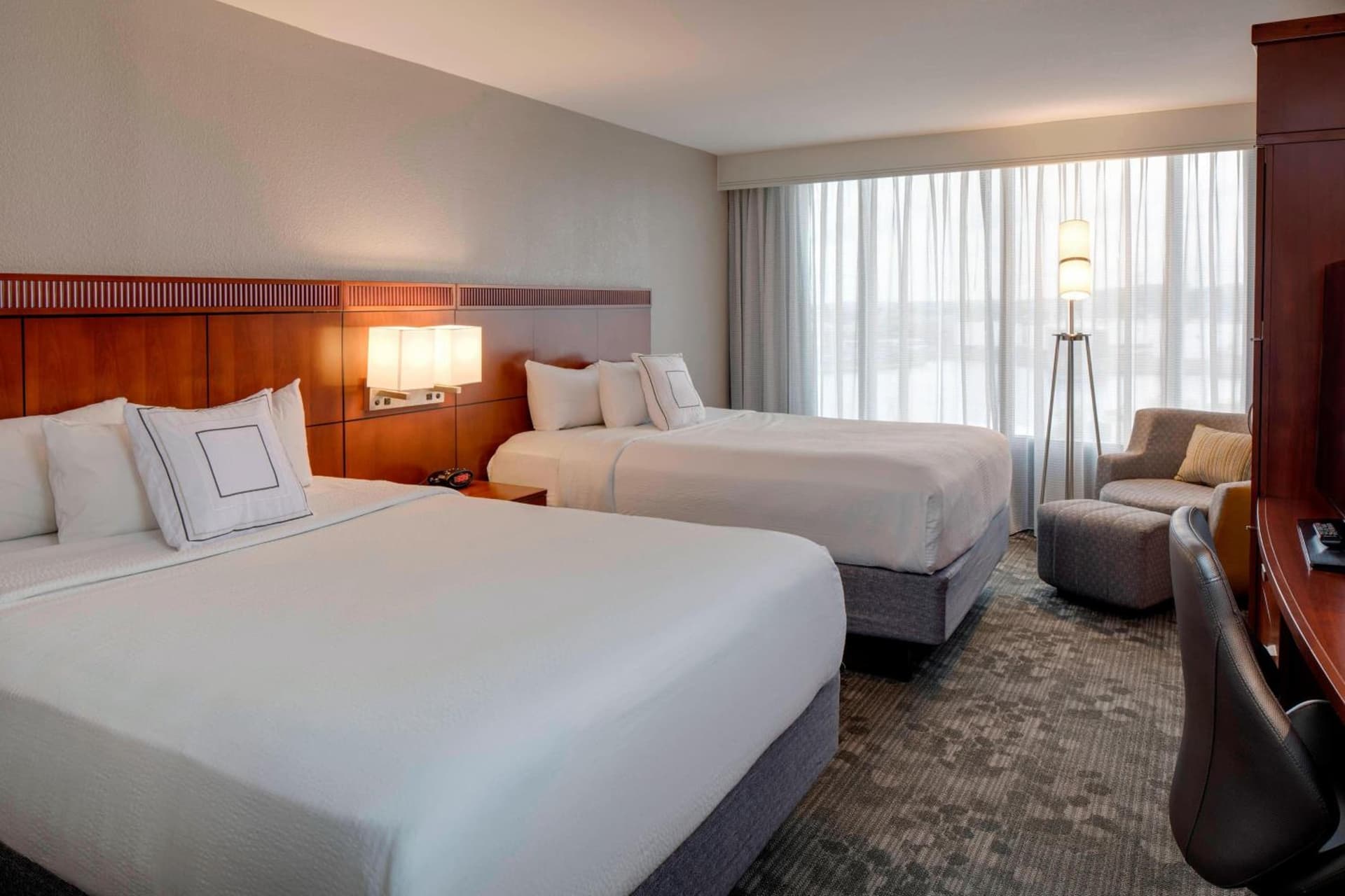 Queen Room with Two Queen Beds at Courtyard by Marriott Boston Logan Airport in Boston, MA