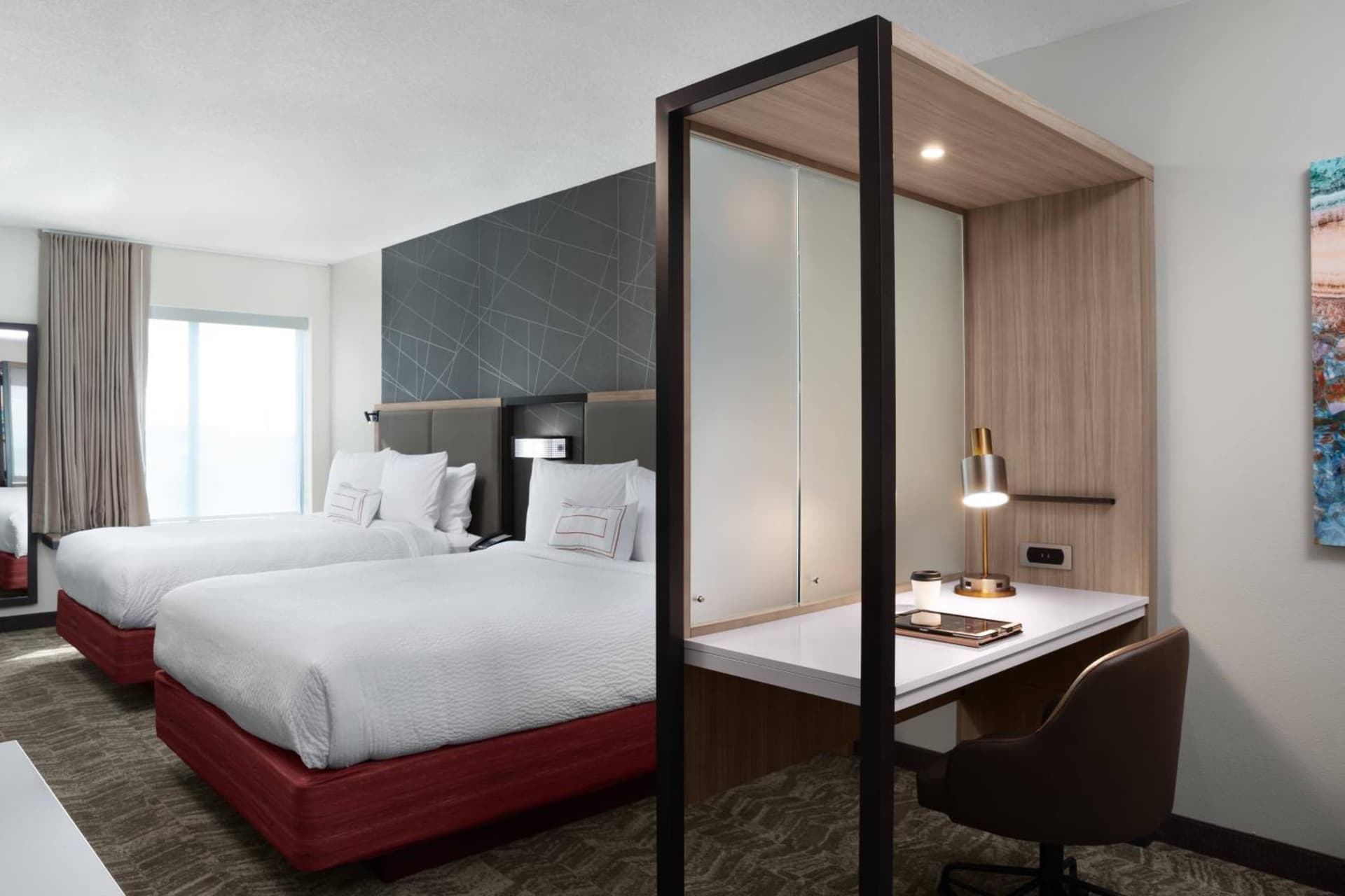 Queen Suite with Two Queen Beds and Sofa Bed at SpringHill Suites by Marriott Orlando Theme Parks Lake Buena Vista in Orlando, FL