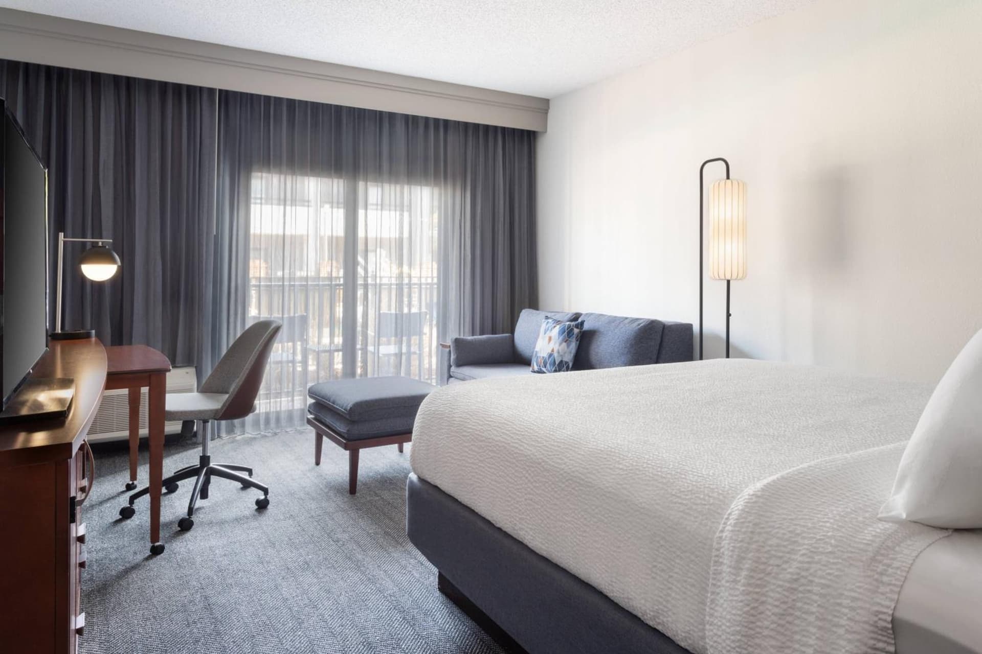 King Room with Sofa Bed and Adapted Tub - Mobility and Hearing Accessible at Courtyard St. Petersburg Clearwater in Clearwater, FL
