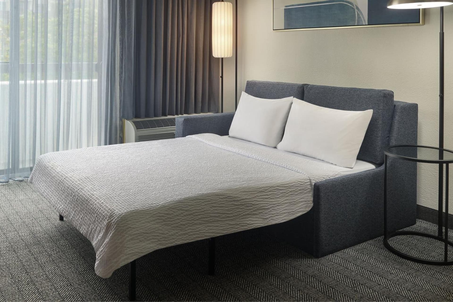 1 Bedroom 2 room Suite, 1 King, Sofa bed at Courtyard by Marriott Atlanta Executive Park/Emory in Atlanta, GA