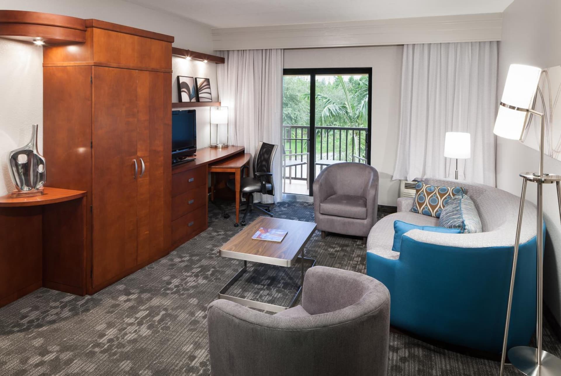 Guest room, 1 King, Sofa bed, Balcony at Courtyard by Marriott Miami at Dolphin Mall in Miami, FL