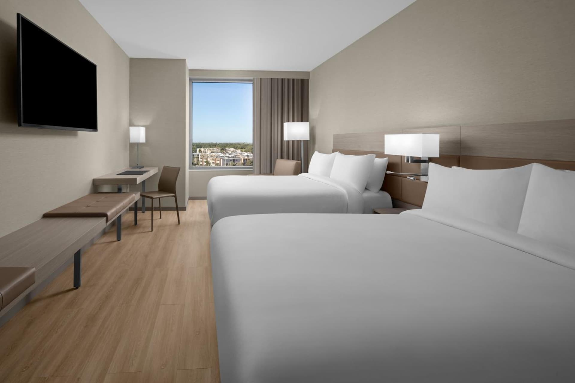 Queen Room with Two Queen Beds and Pool View - Hearing Accessible at AC Hotel by Marriott Miami Dadeland in Miami, FL