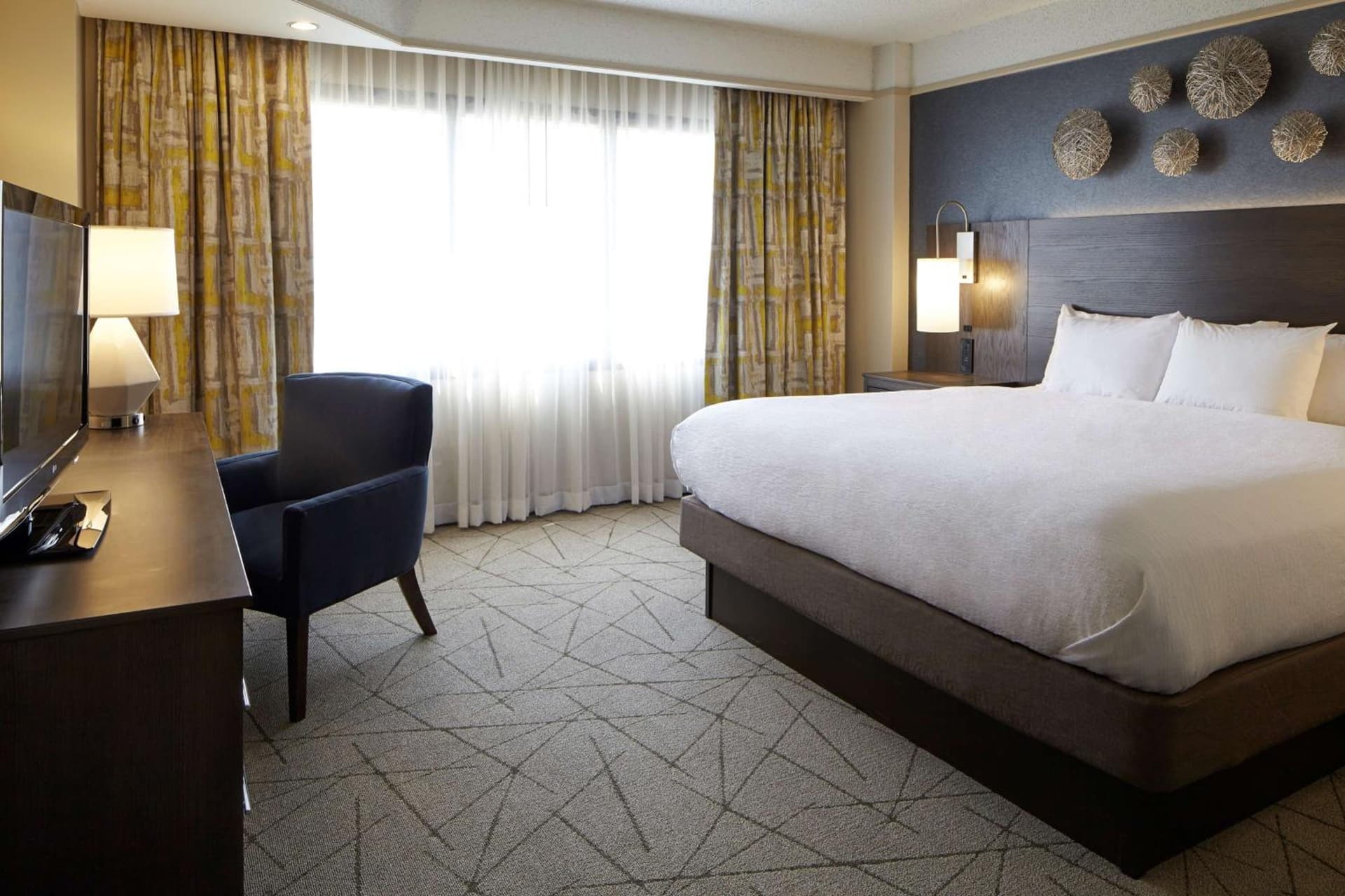 King Suite with Bath Tub and Sofa Bed - Mobility Access/ Non-Smoking at Embassy Suites by Hilton Atlanta Galleria in Atlanta, GA