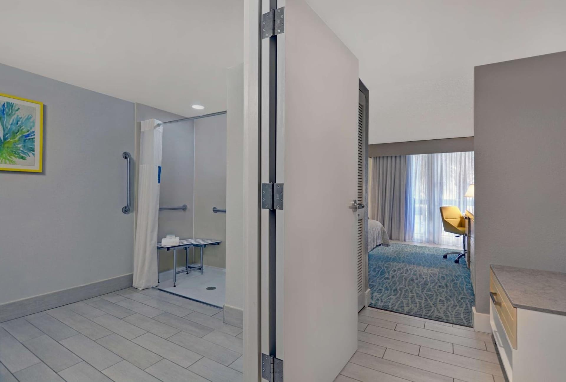 1 King Ground Floor Room Limited Ocean View at Hampton Inn Oceanfront Jacksonville Beach in Jacksonville Beach, FL
