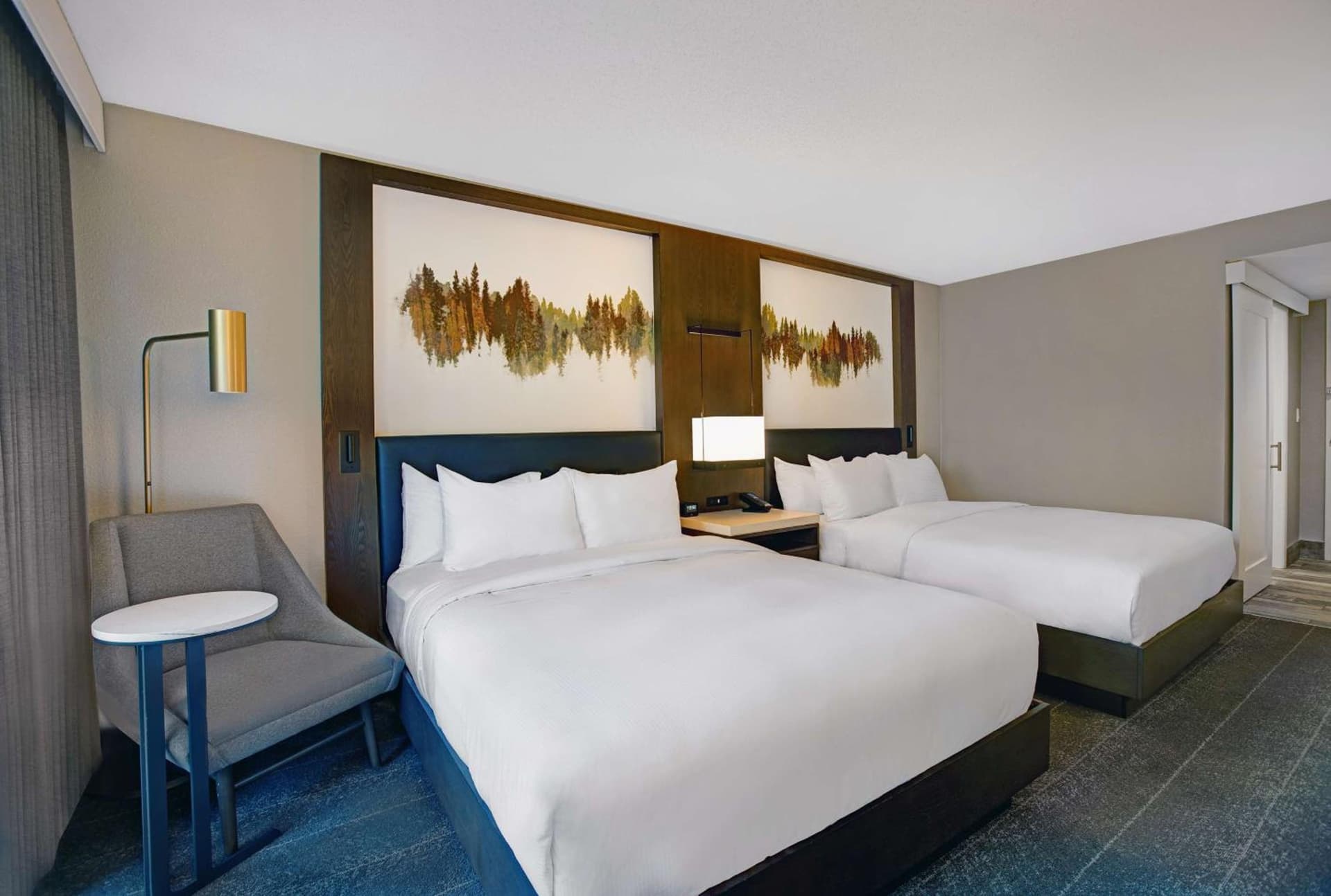 Queen Room with Two Queen Beds with Pool View at Hilton Peachtree City Atlanta Hotel & Conference Center in Peachtree City, GA