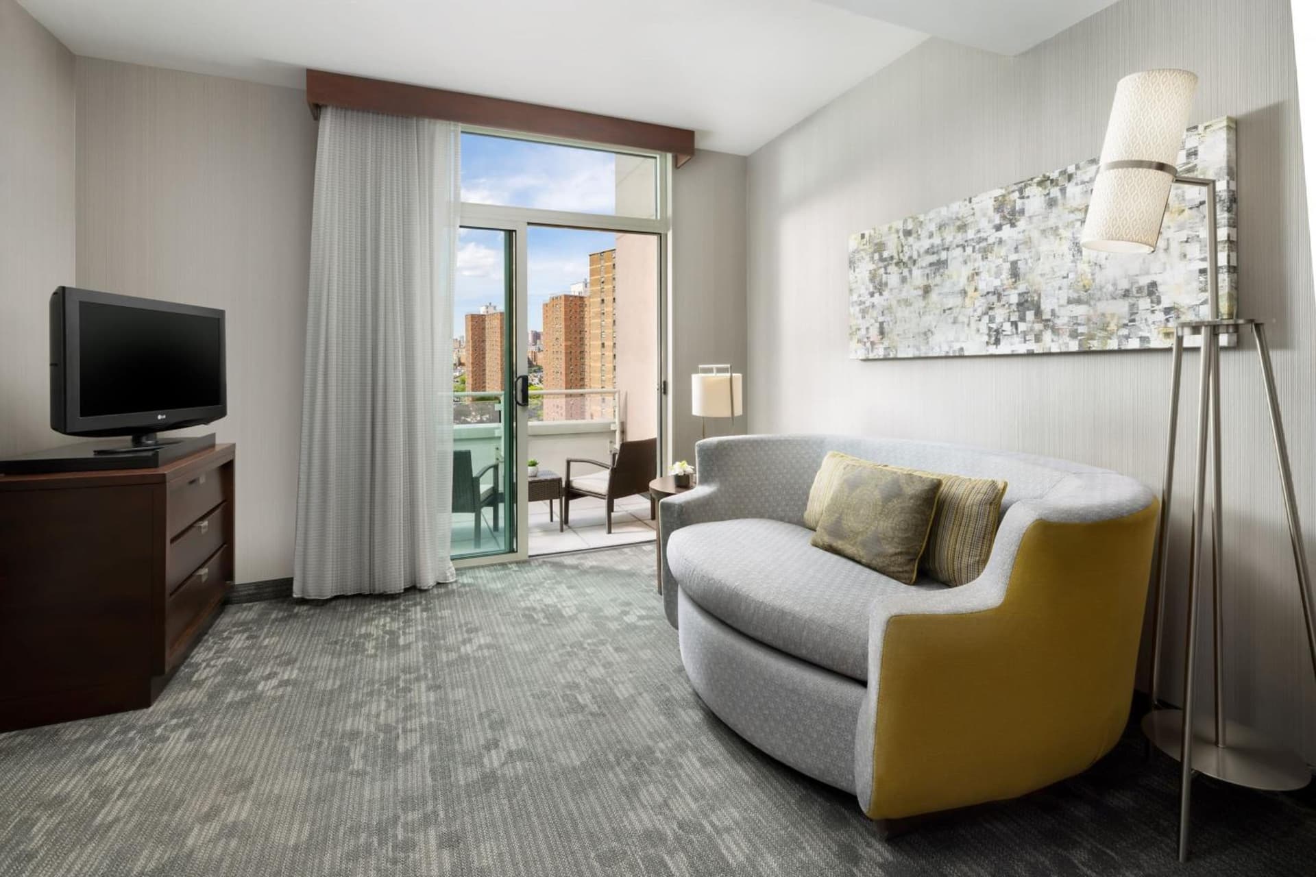 One-Bedroom King Suite with Sofa Bed and Balcony  at Courtyard by Marriott New York Manhattan Upper East Side in New York, NY