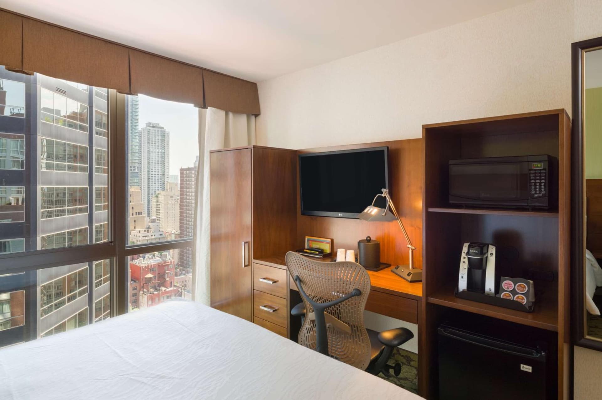 King Room with Floor to Ceiling Window at Hilton Garden Inn New York Manhattan Midtown East in New York, NY