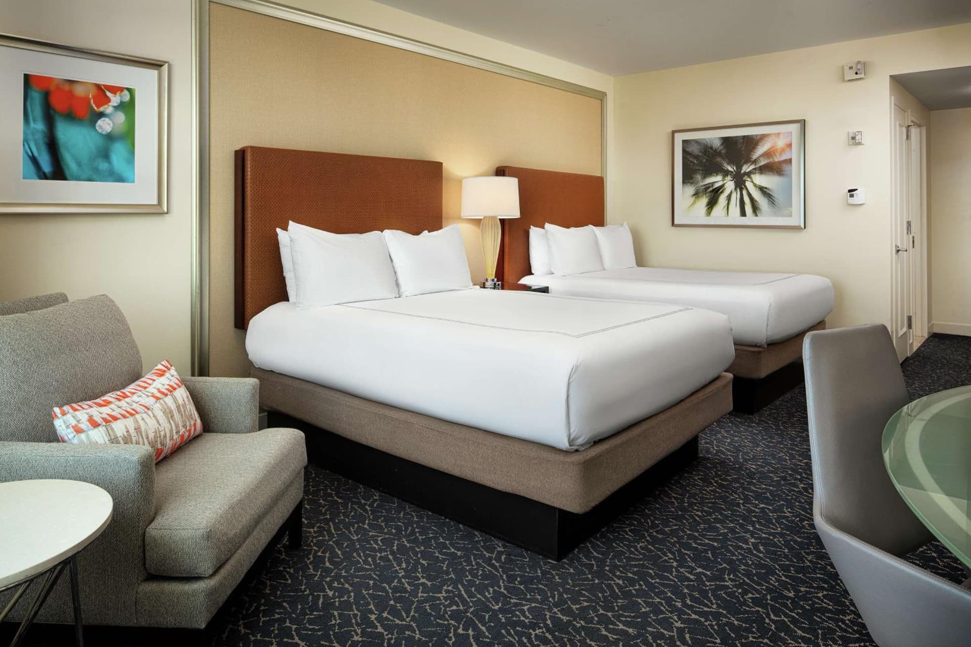 Queen Room with Two Queen Beds and Pool View - High Floor at Hilton Orlando in Orlando, FL