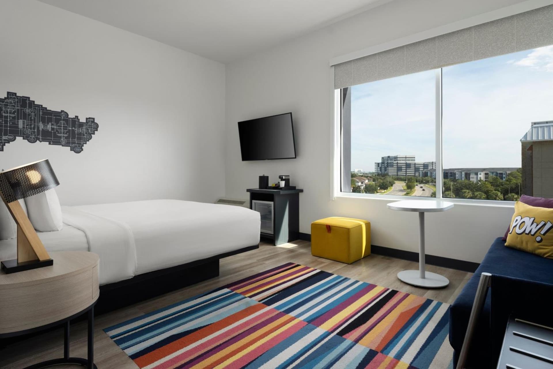 Larger Guest room, 1 King at Aloft Orlando Lake Buena Vista in Orlando, FL