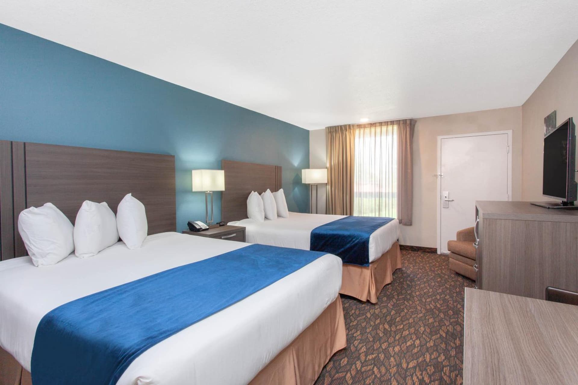 Queen Room with Two Queen Beds at Grand Hotel Orlando at Universal Blvd - Shuttle to Theme Parks in Orlando, FL