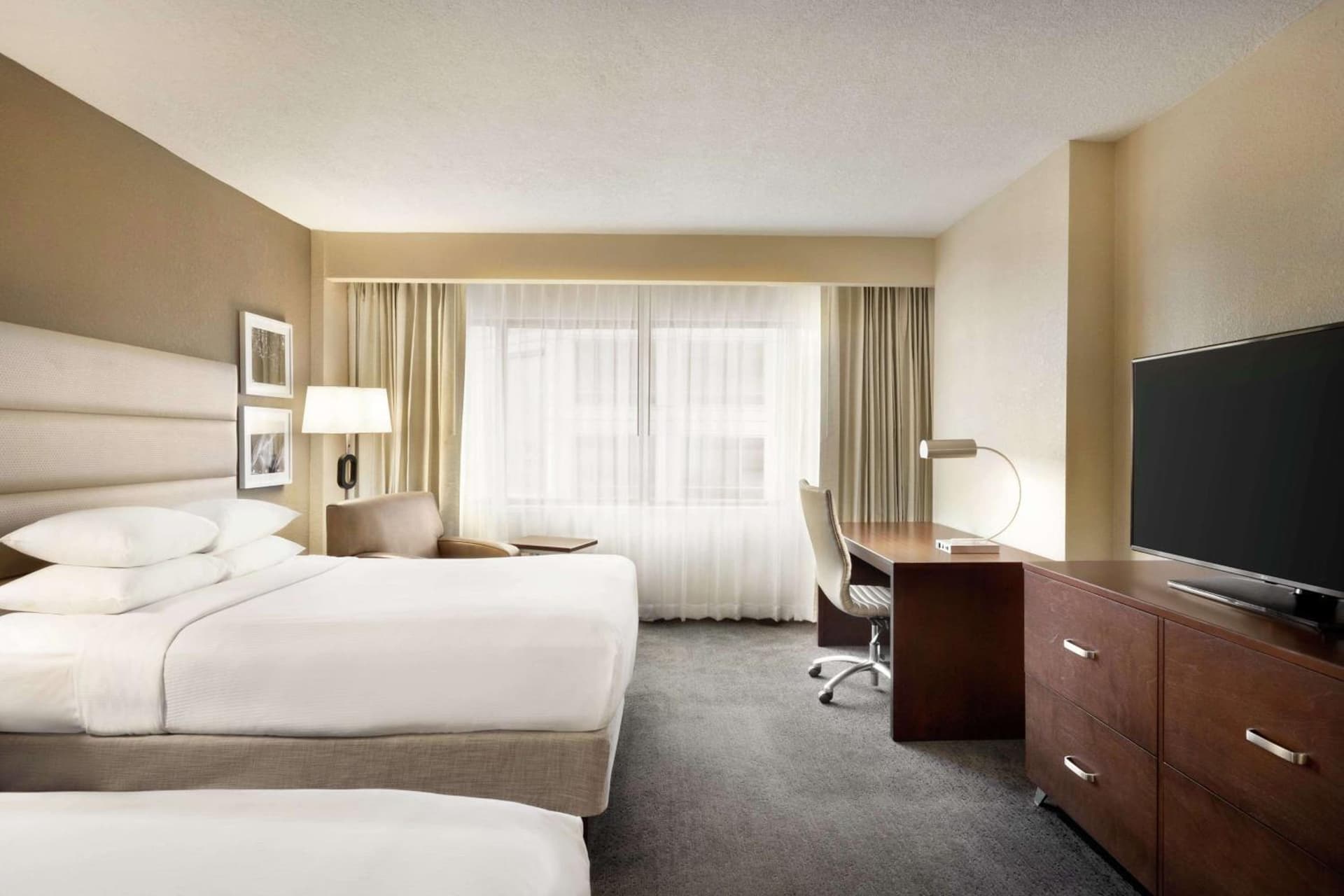 Queen Room with Two Queen Beds at DoubleTree by Hilton Orlando Downtown in Orlando, FL