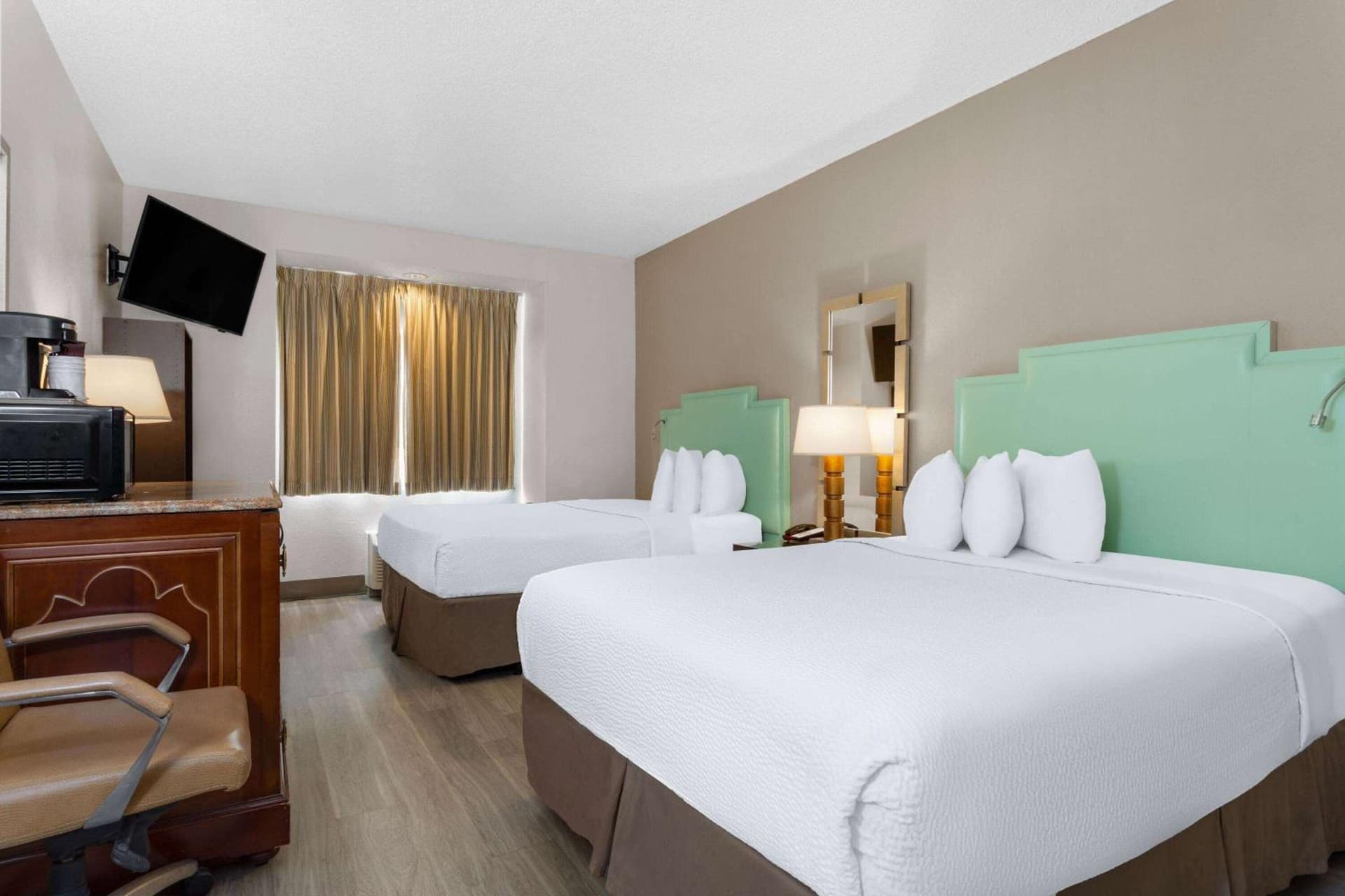 Room with Two Queen Beds and Mobility/Hearing Access and Roll-In Shower, Non-Smoking at Baymont by Wyndham Orlando-International Dr-Universal Blvd in Orlando, FL