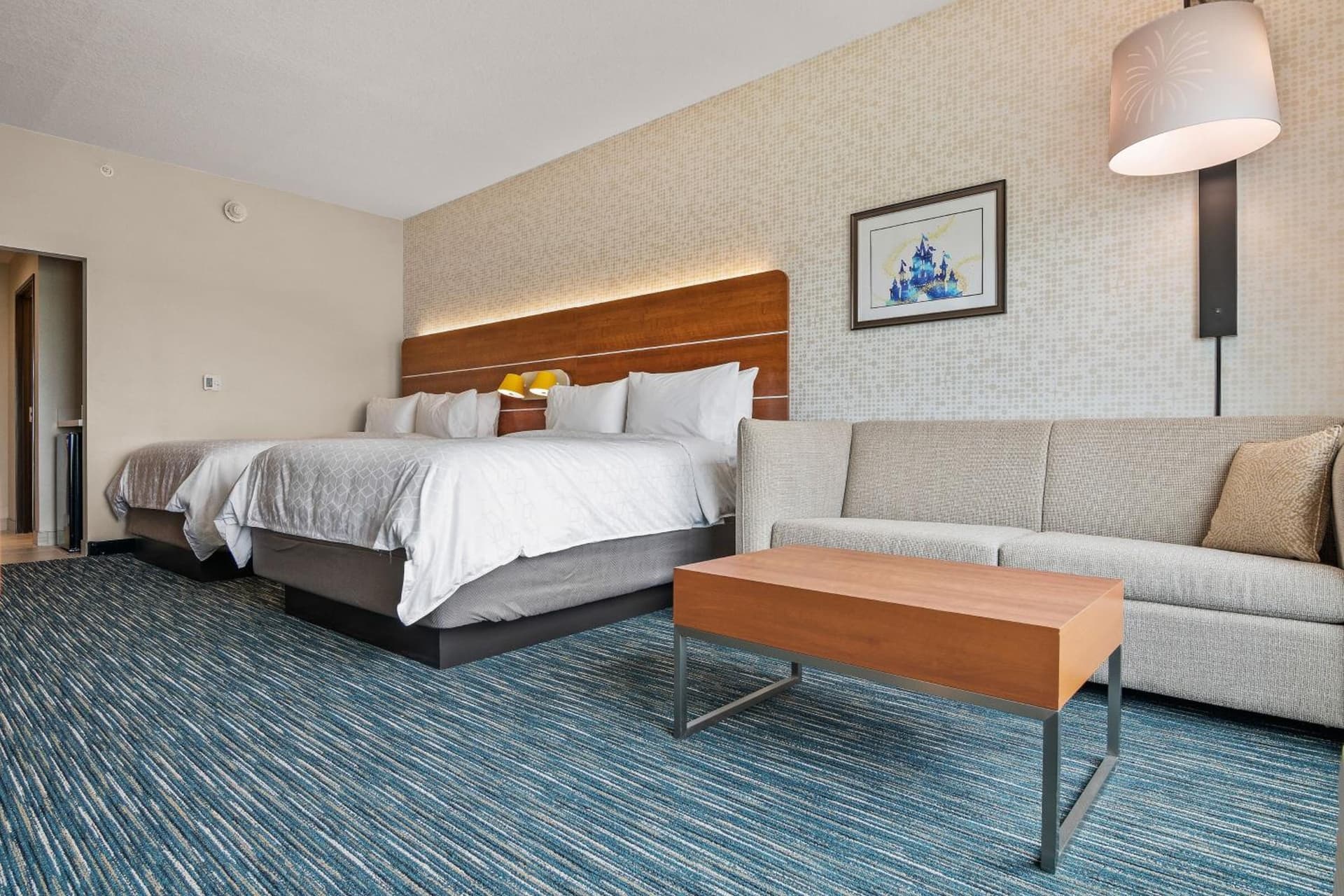 Queen Suite with Two Queen Beds and Sofa Bed at Holiday Inn Express & Suites Orlando- Lake Buena Vista by IHG in Orlando, FL