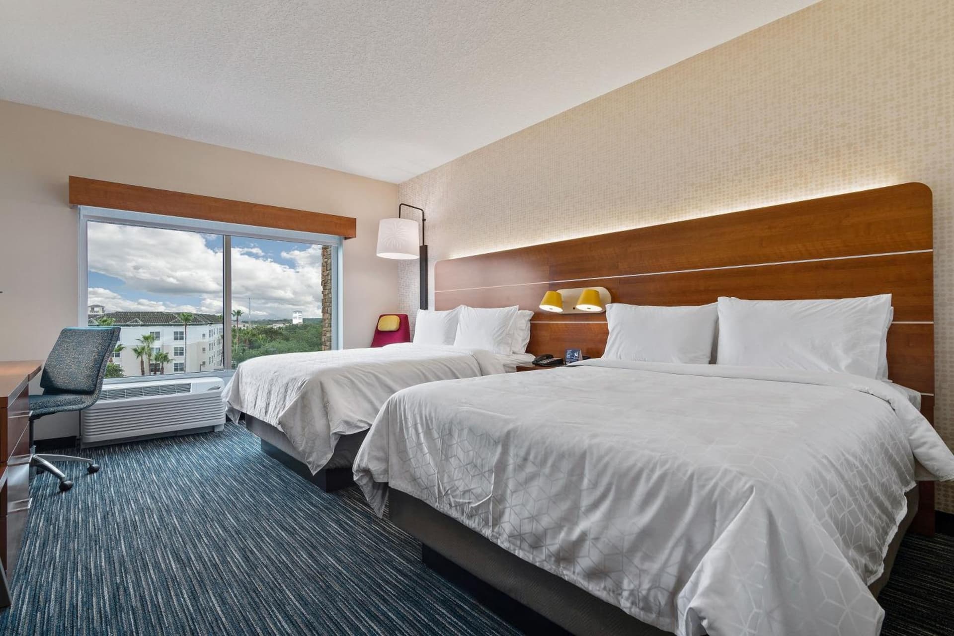 Standard Room with Two Queen Beds at Holiday Inn Express & Suites Orlando- Lake Buena Vista by IHG in Orlando, FL