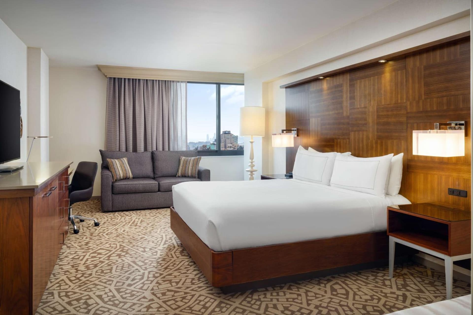 King Corner Studio Suite with Sofa Bed and View  at Hilton New York Times Square in New York, NY