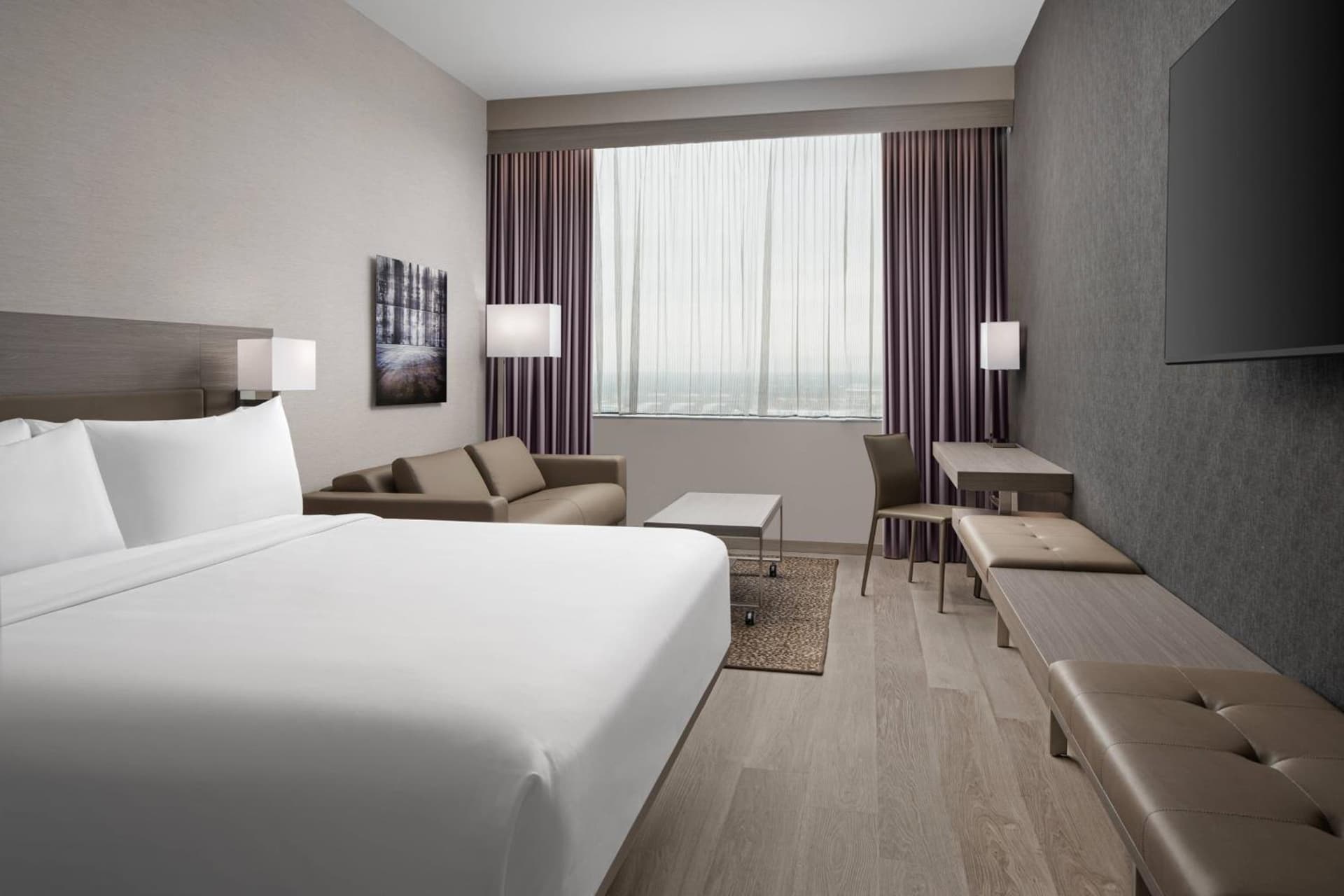 King Guest Room with Sofa Bed and City View at AC Hotel by Marriott Orlando Downtown in Orlando, FL