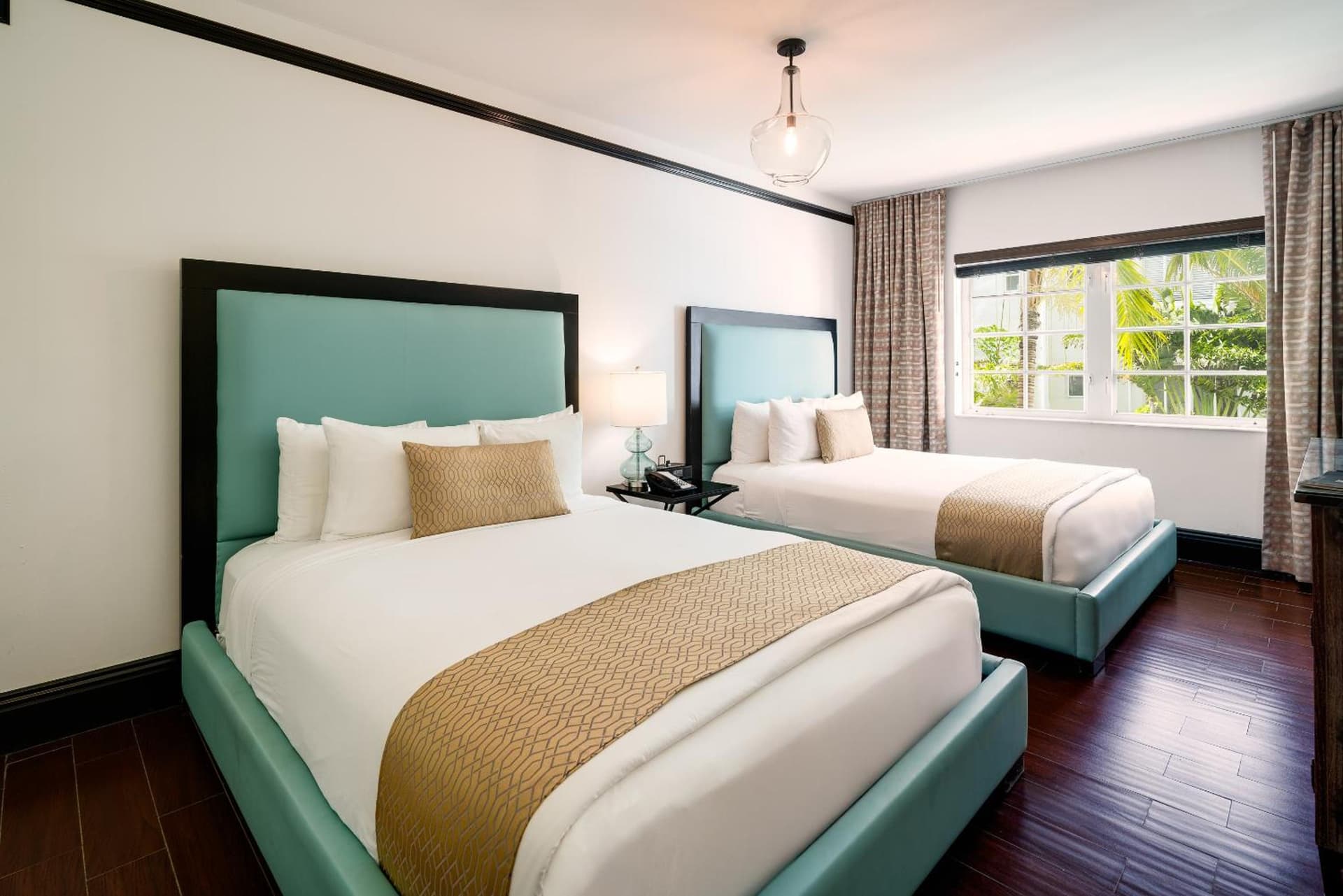 Classic Double Queen Pool View Room at Hotel Croydon in Miami Beach, FL