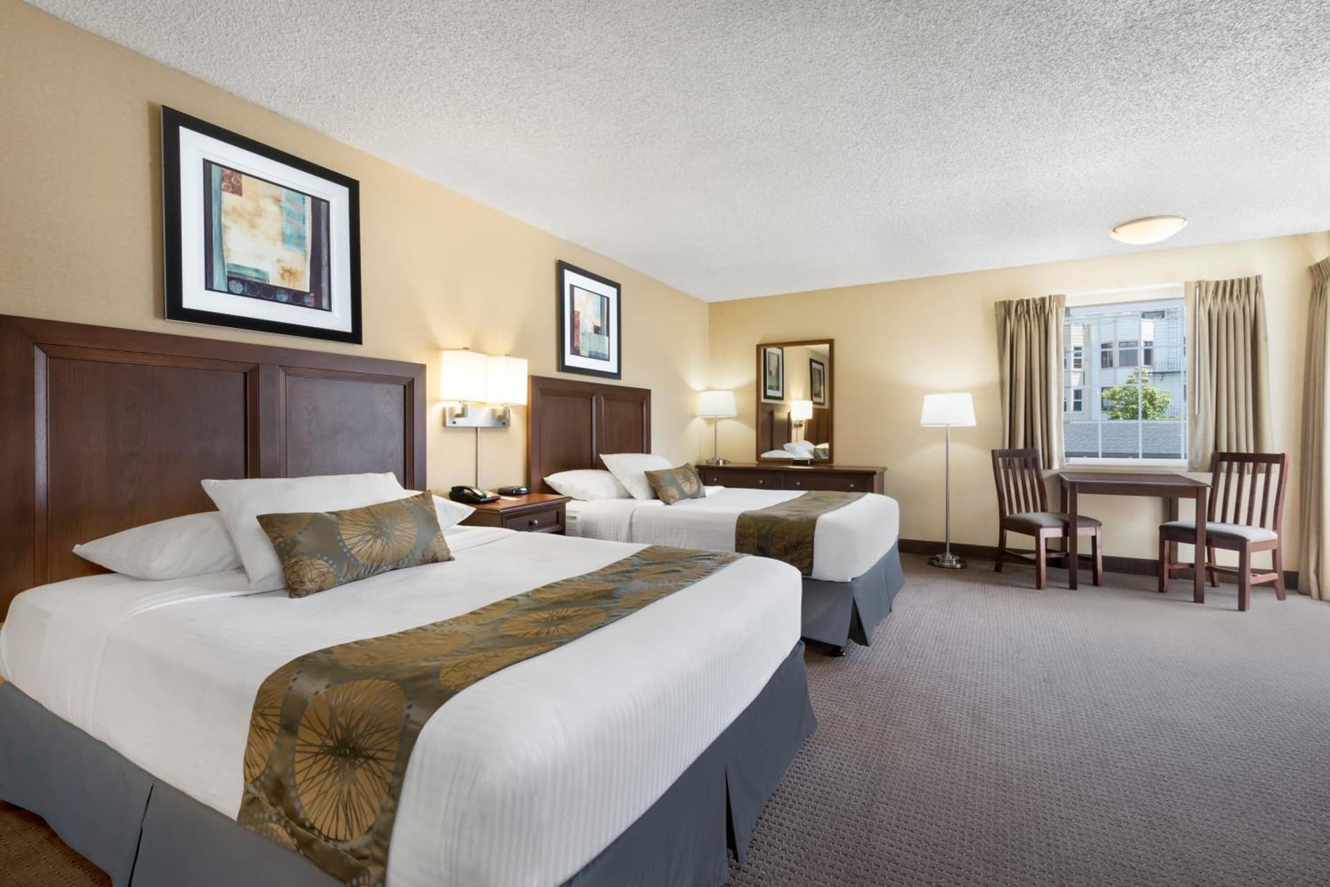 Queen Room with Two Queen Beds - Non-Smoking at Travelodge by Wyndham San Francisco Bay in San Francisco, CA