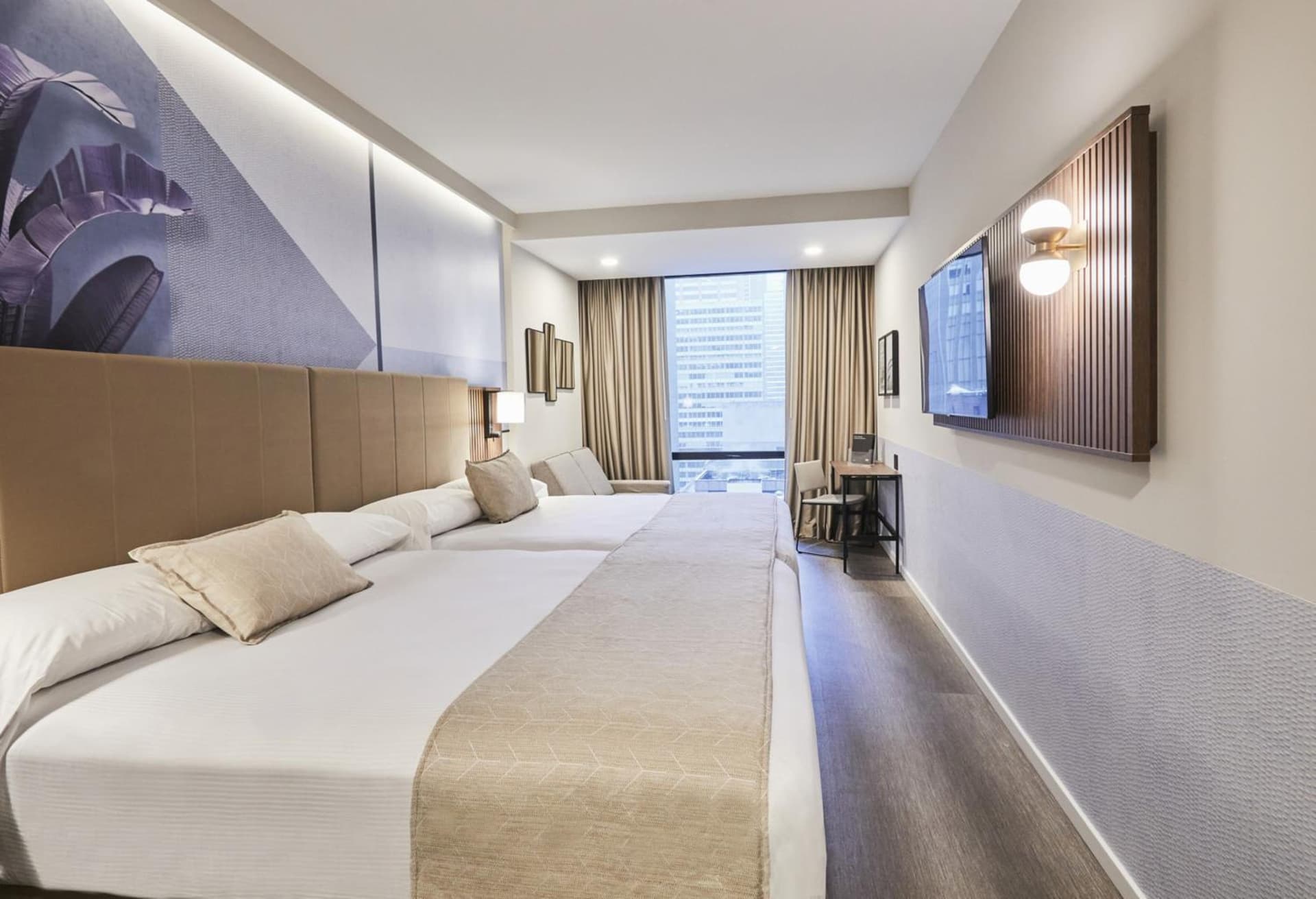 Deluxe Family Two Queen Beds at Hotel Riu Plaza Manhattan Times Square in New York, NY
