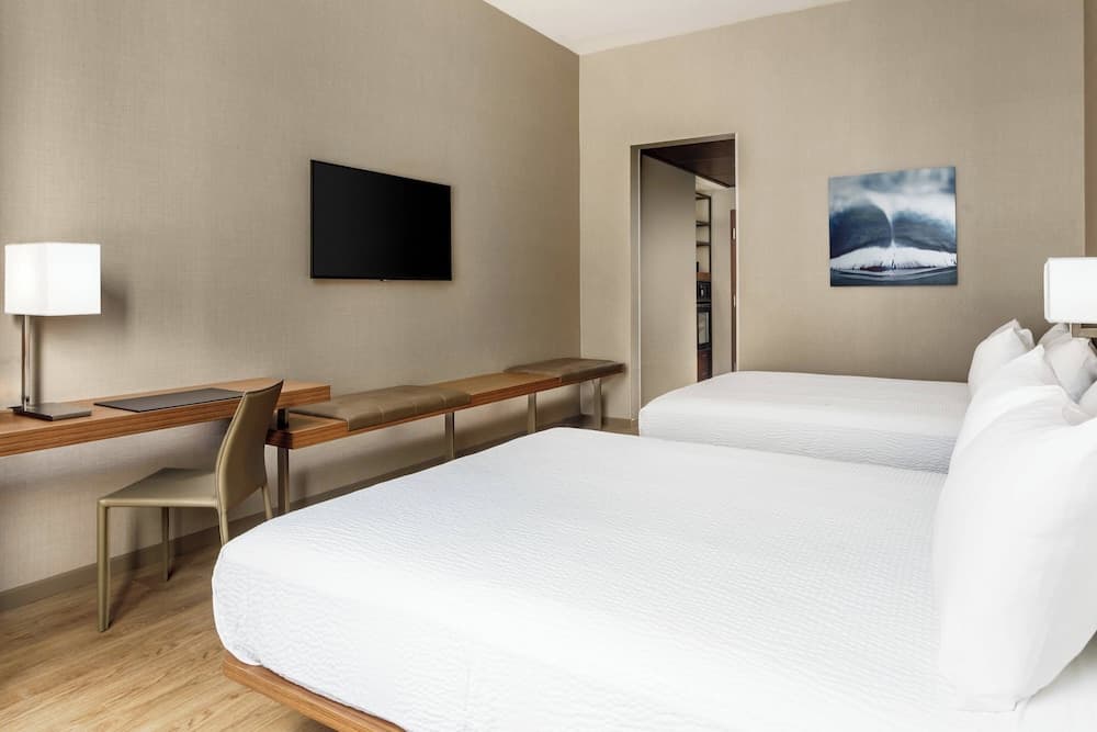 Room, 2 Queen Beds (Mobility/Hearing Access, Roll-In Shwr) at AC Hotel by Marriott San Francisco Airport/Oyster Point Waterfront in South San Francisco, CA