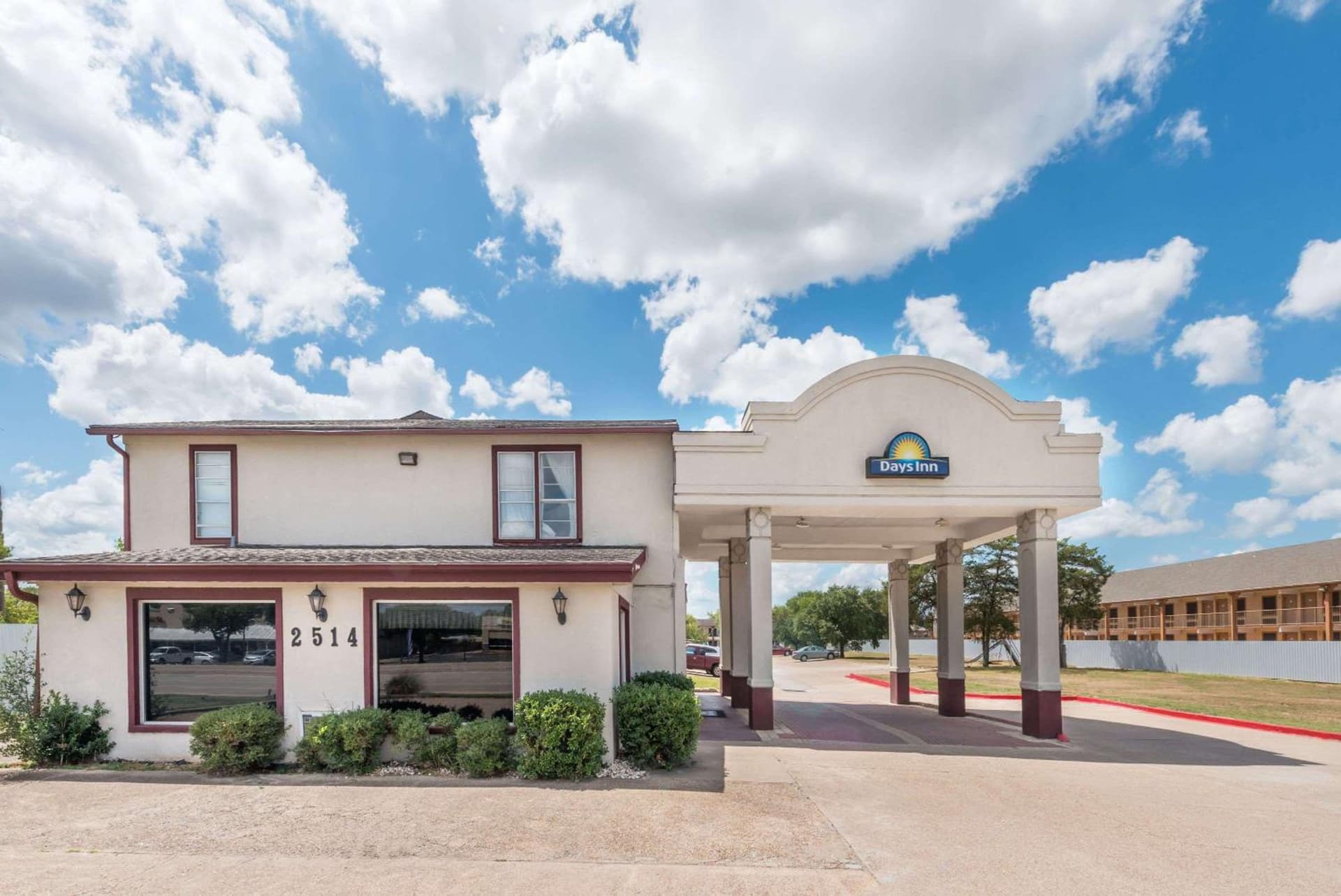 Days Inn by Wyndham Bryan College Station featured exterior or lobby in College Station, TX — similar hotel