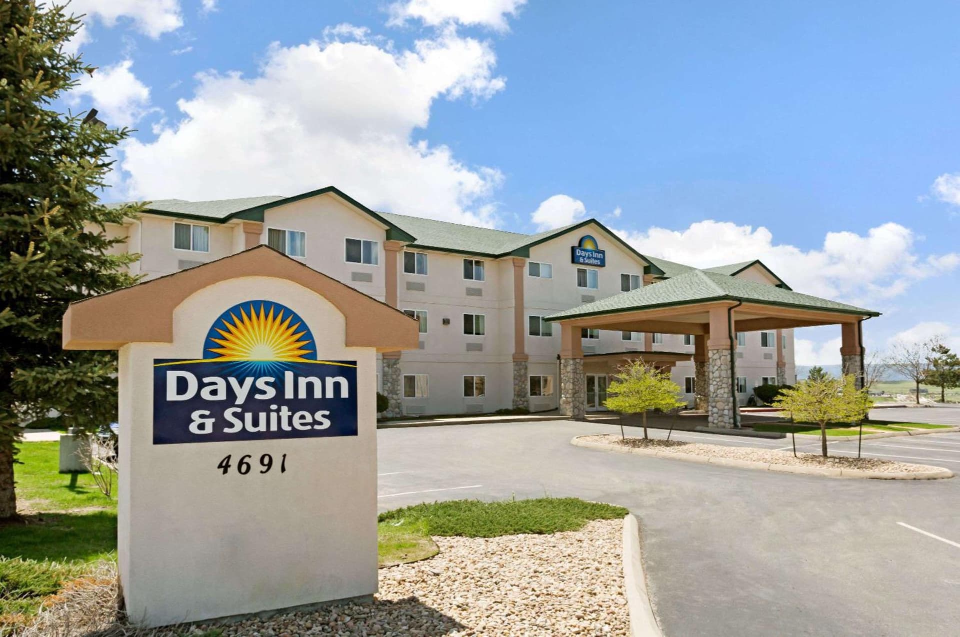 Days Inn & Suites by Wyndham Castle Rock featured exterior or lobby in Castle Rock, CO — similar hotel