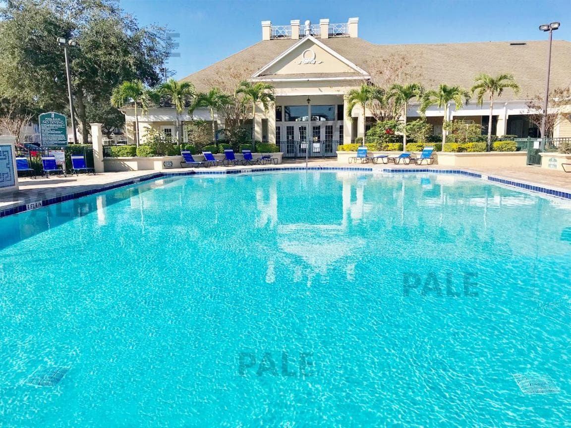 COZY 4-BEDROOM TOWNHOME IN A VACATION RESORT near DISNEY-ORLANDO featured exterior or lobby in Kissimmee, FL — similar hotel