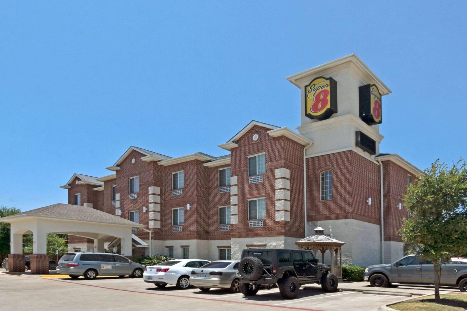 Super 8 by Wyndham Austin/Airport South featured exterior or lobby in Austin, TX — similar hotel