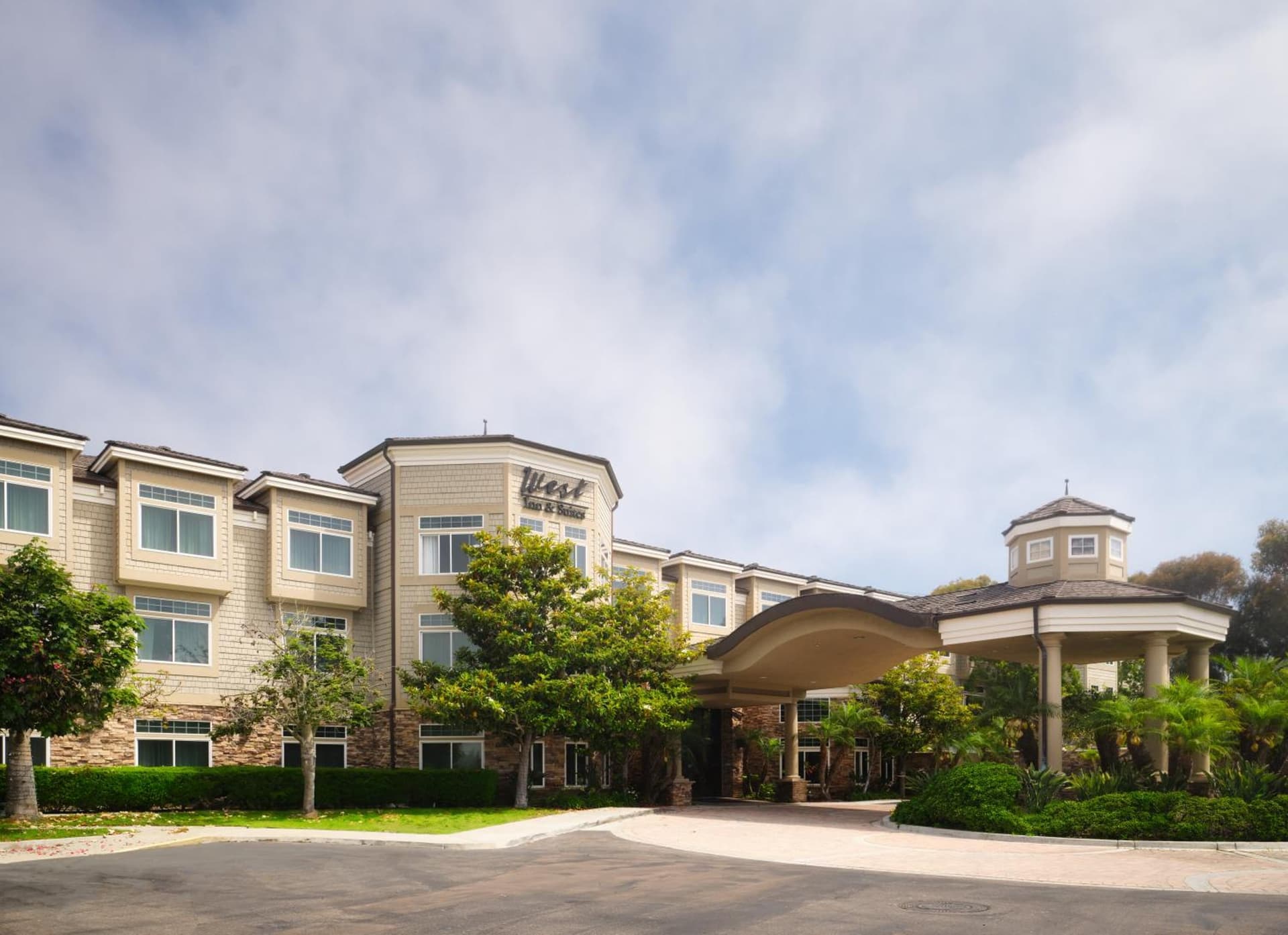 West Inn & Suites featured exterior or lobby in Carlsbad, CA — similar hotel