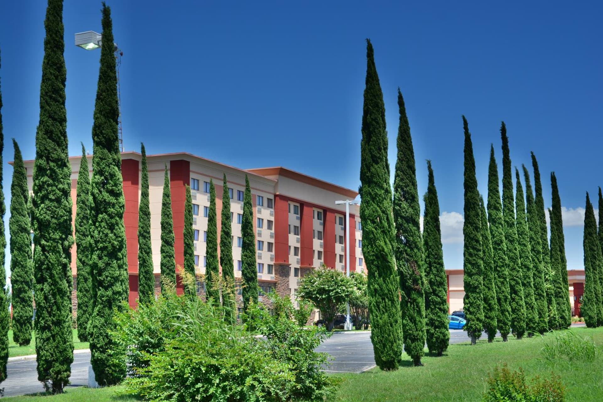 Lux Hotel & Spa exterior or lobby in Arlington, TX — main listing photo