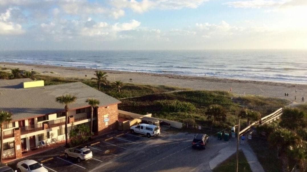 Sandcastles Condominium Complex featured exterior or lobby in Cocoa Beach, FL — similar hotel