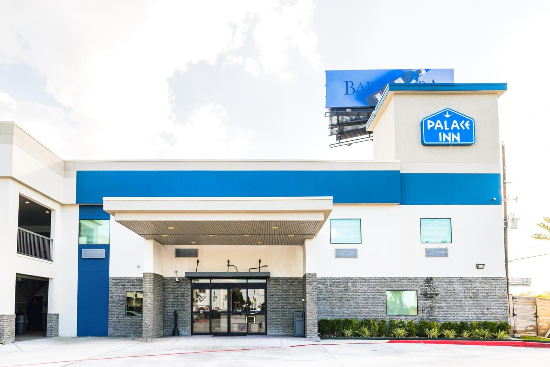 Palace Inn IAH Houston Bush Intercontinental Airport featured exterior or lobby in Humble, TX — similar hotel