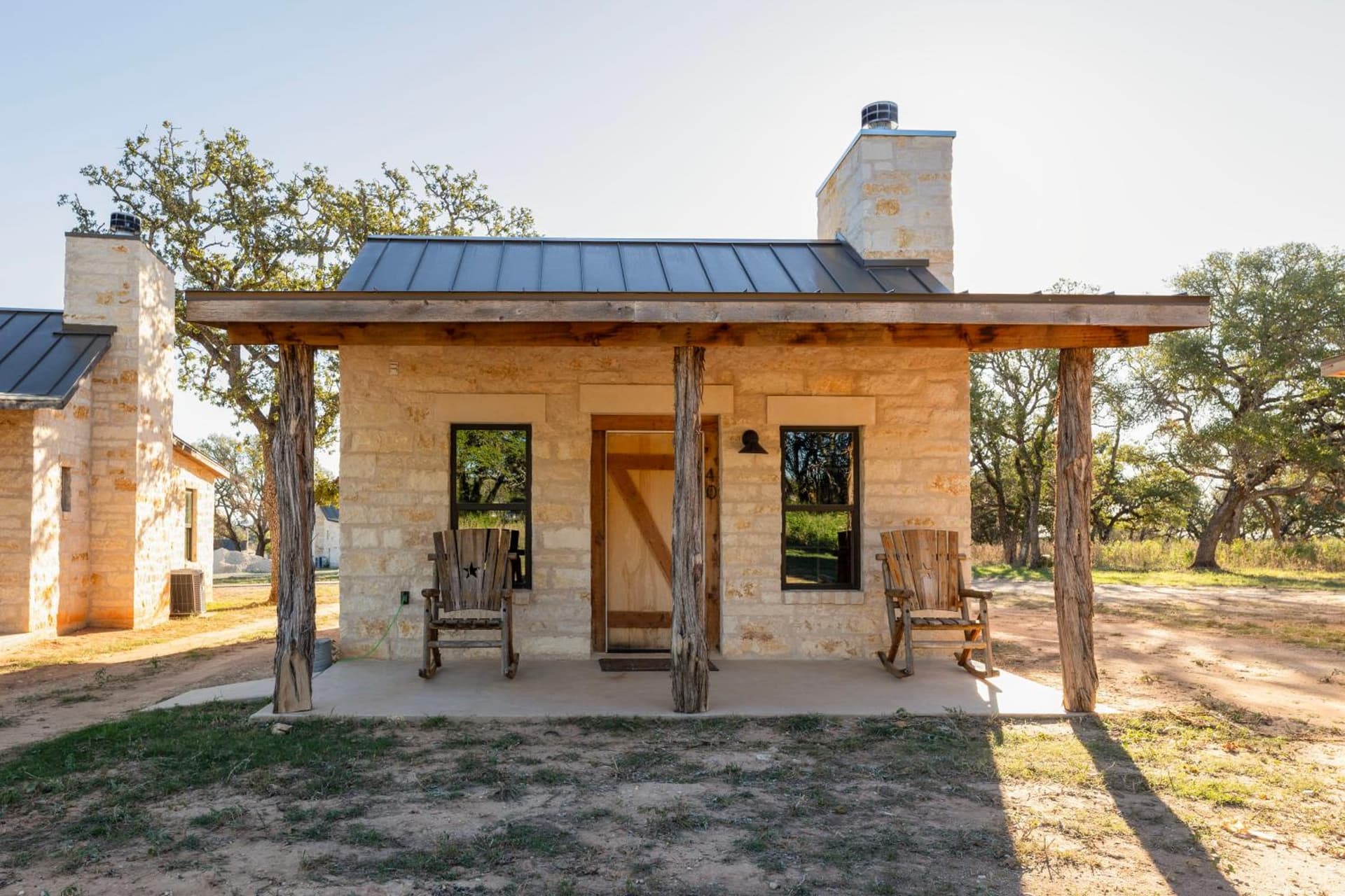 Country Inn Cottages featured exterior or lobby in Fredericksburg, TX — similar hotel