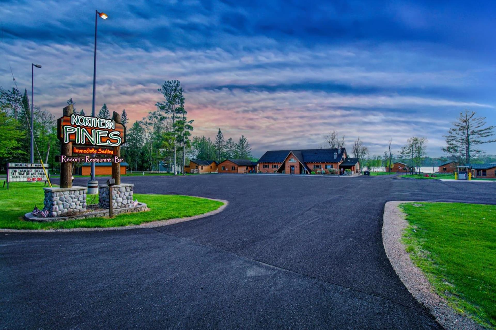Lena's Northern Pines Resort featured exterior or lobby in Park Falls, WI — similar hotel
