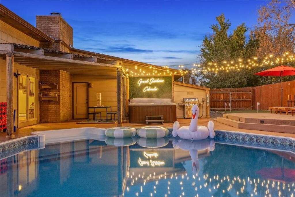 Pool-Hot Tub-Tiki Bar-Game Room-Fire Pit-Mini Golf property views in Grand Junction, CO — gallery photo 3