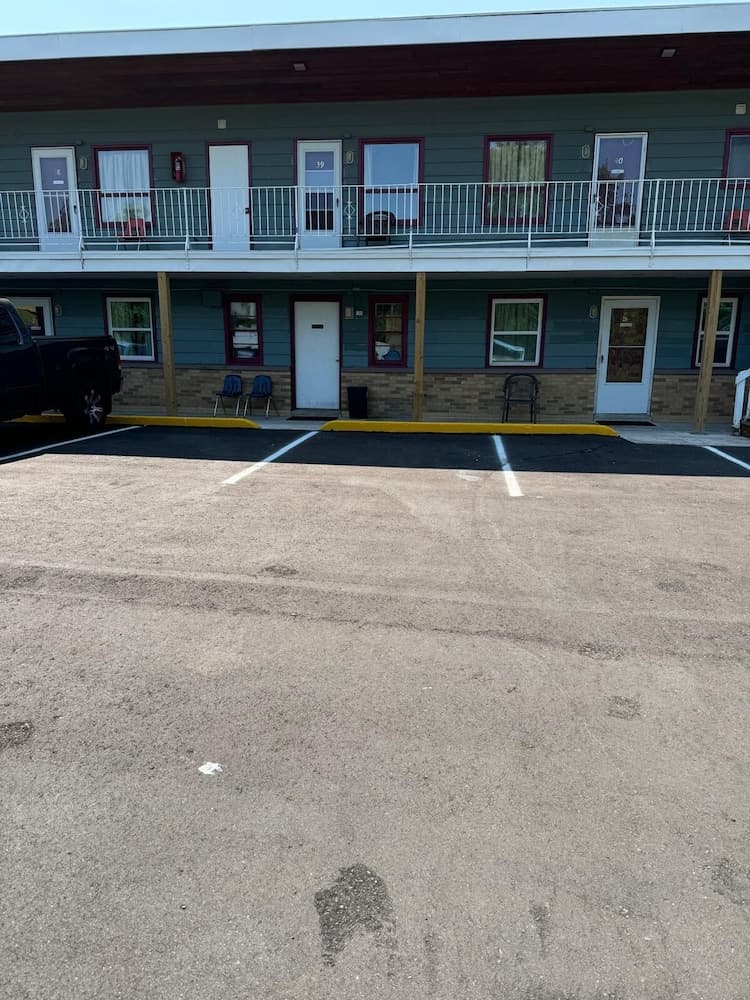 Economy Inn Cadillac MI by Hotel O featured exterior or lobby in Cadillac, MI — similar hotel