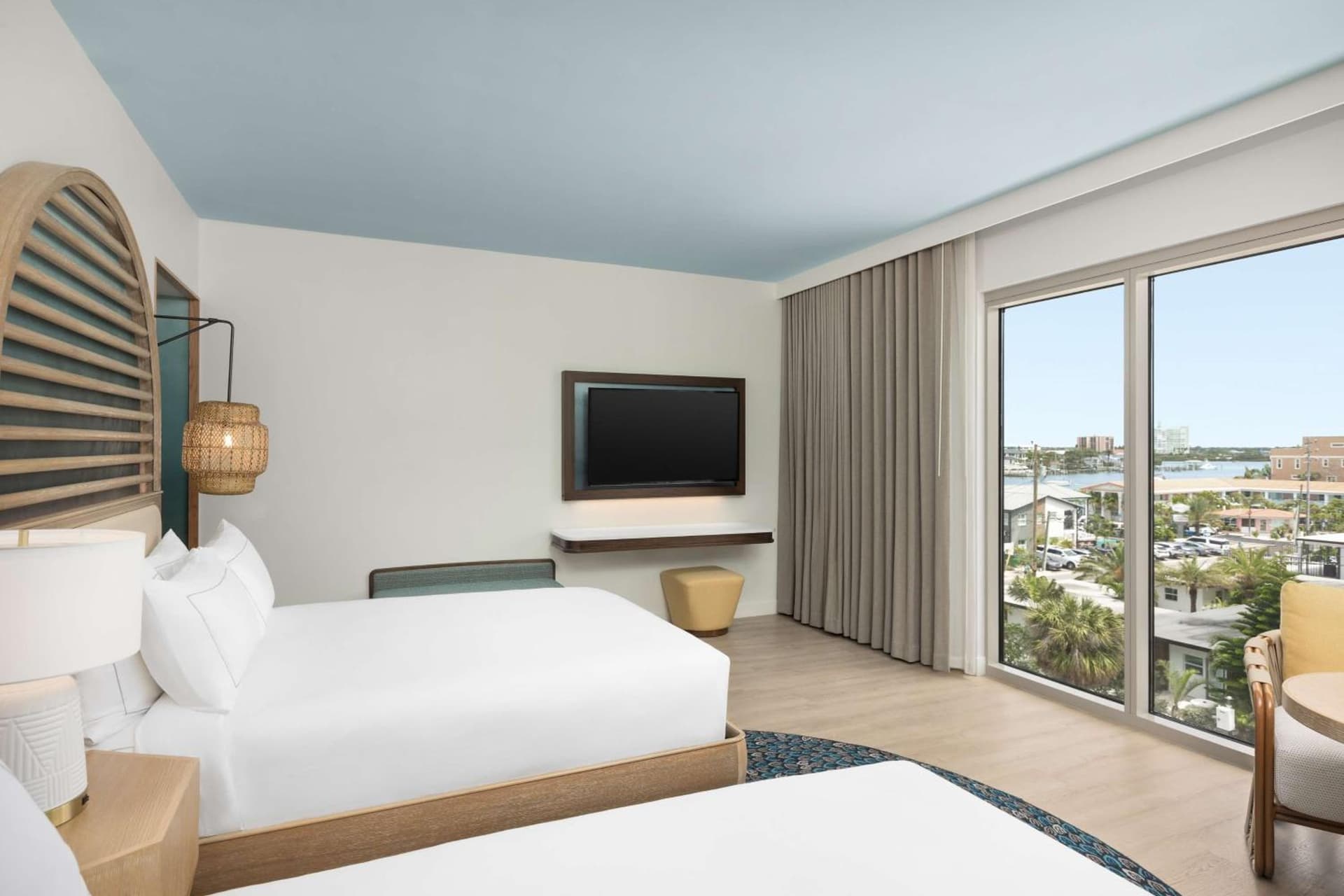 Queen Room with Two Queen Beds and City View at The Hiatus Clearwater Beach, Curio Collection By Hilton in Clearwater Beach, FL